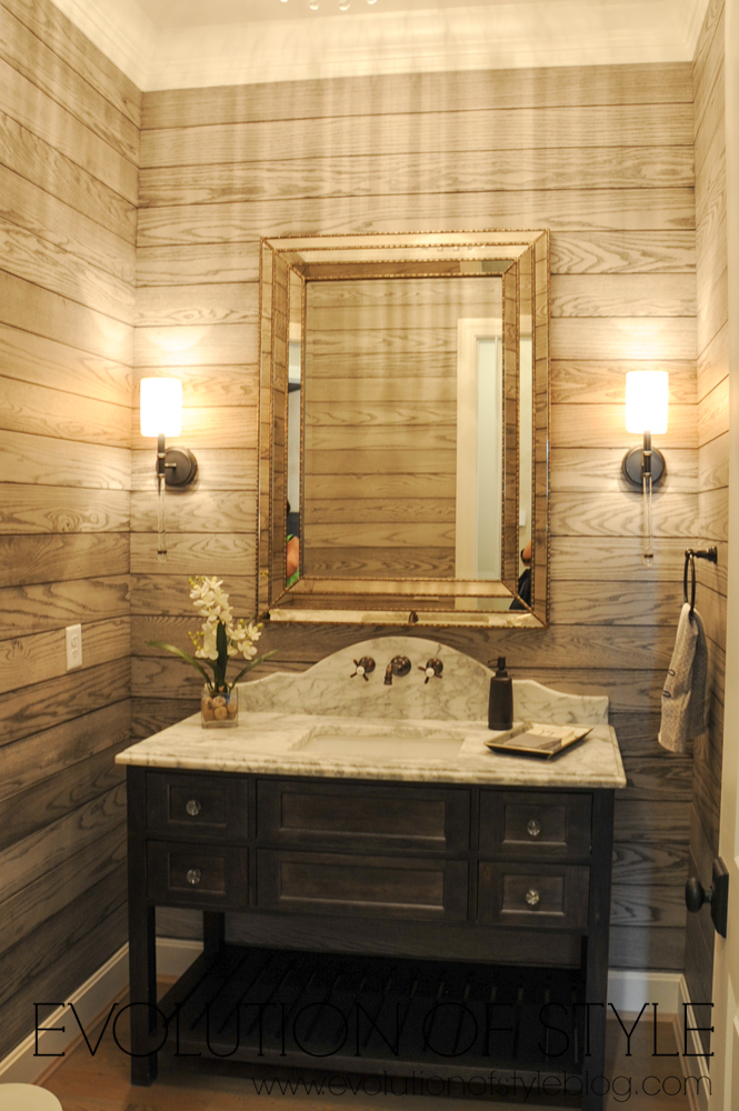 Stained wood shiplap powder room