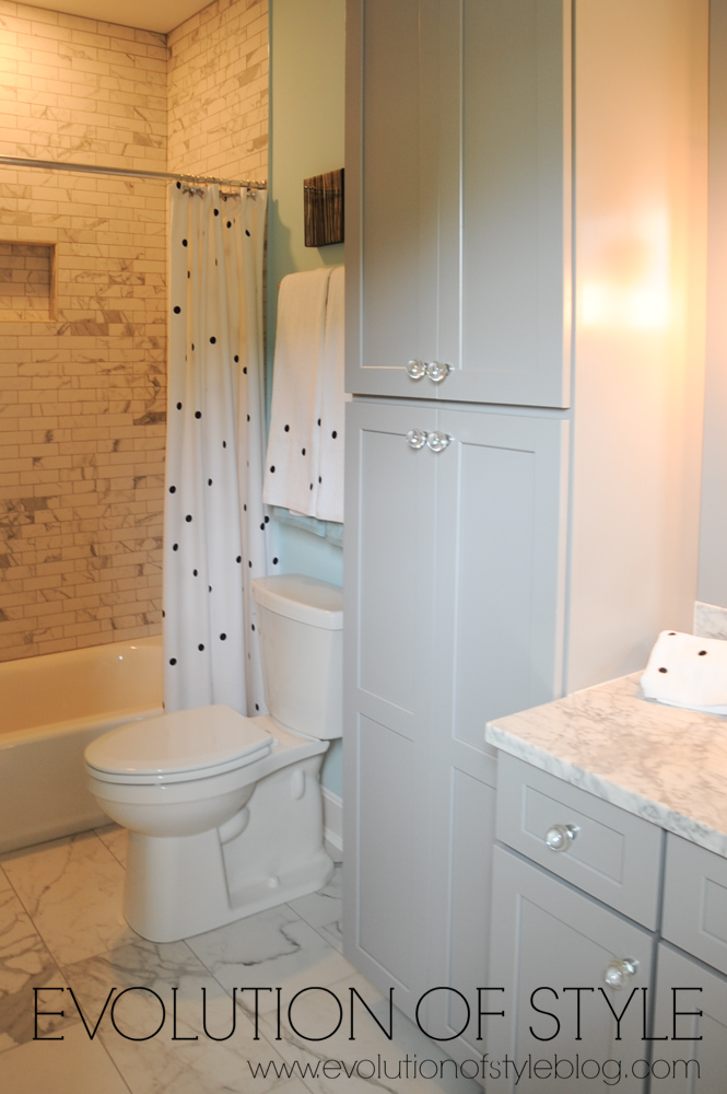 Girl's bathroom with taupe cabinets