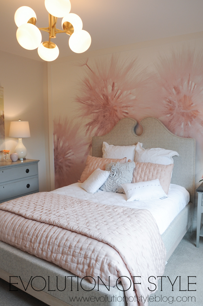 Pink bedroom with mural