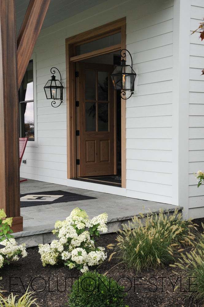 Modern farmhouse with exterior gaslamps