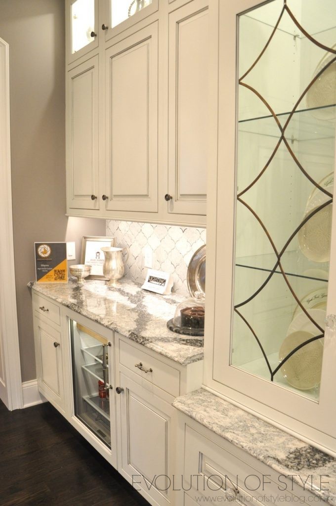 White kitchen with leaded glass doors