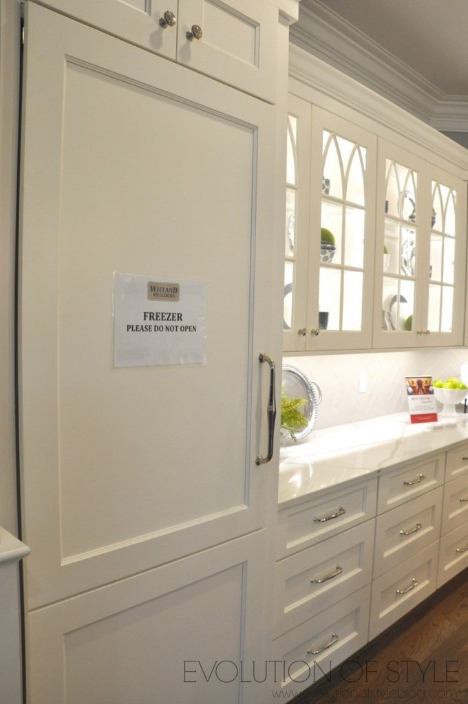 White kitchen with glass doors